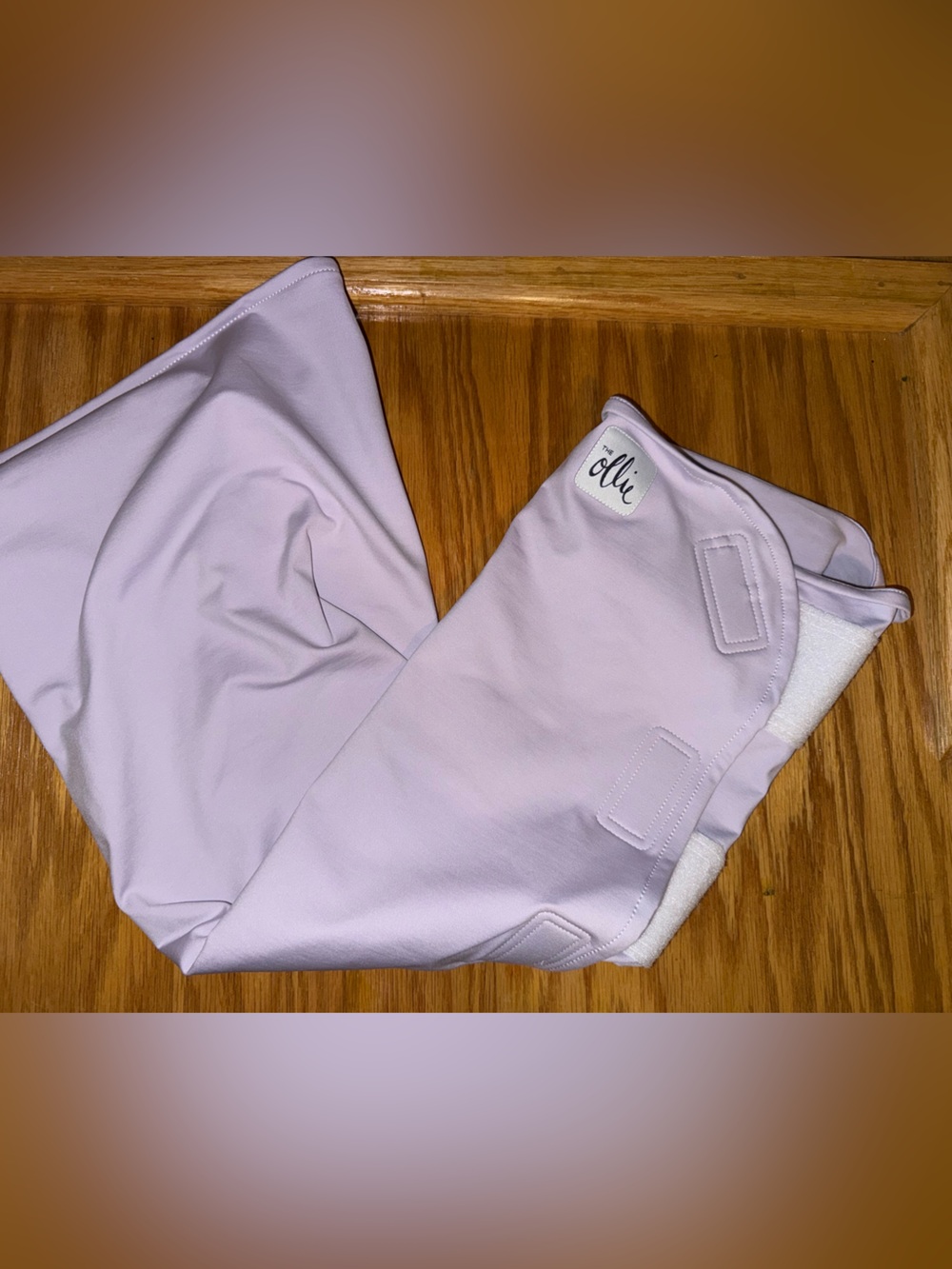 The Ollie World purple swaddle with Mesh Storage Bag